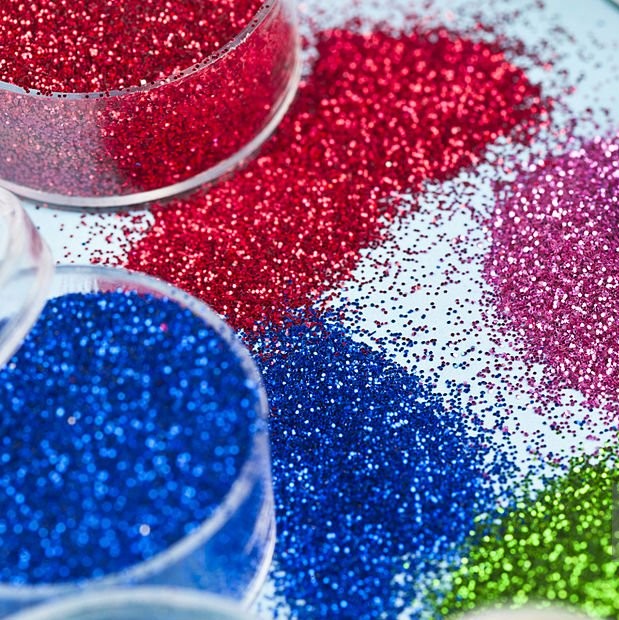 Craft glitter pots and spilt glitter
